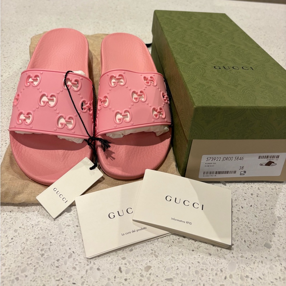 Gucci Pink GG Embossed Slide Sandals